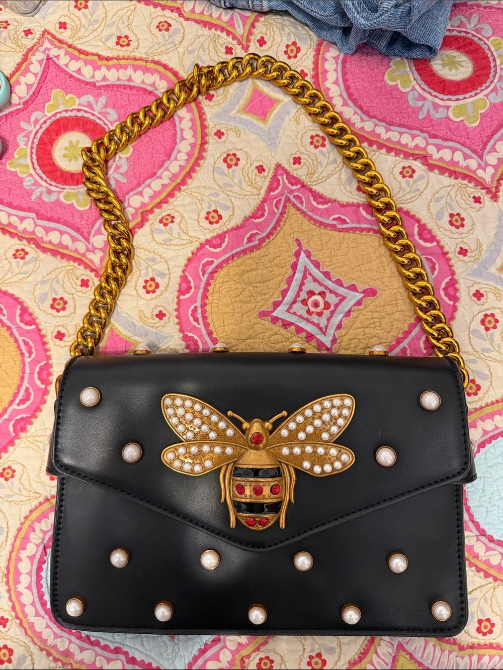 Pearl-Embellished Black Shoulder Bag with Gold Bee Accent